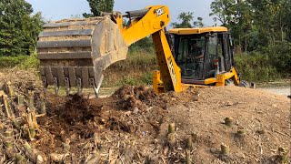 JCB Backhoe Loader Busy With Bamboo Root Extraction droneplanet2040 [upl. by Nahgrom]