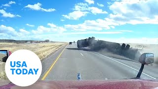 Dramatic video Semitruck overturns on interstate  USA TODAY [upl. by Atok800]