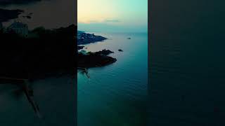 Coastal Rocks and Distant Manor  Stunning Drone Footage of Dramatic Seascapes coast drone sea [upl. by Ferri615]