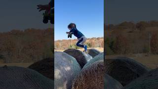 Jumping Hay Bales On The ranch shorts haybales farmfun farmboy parkour ranch [upl. by Chaddy]