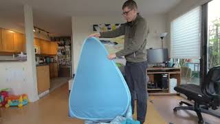 How to Fold Up a Beach Tent  Popup Sun tent easy instructions [upl. by Berners218]