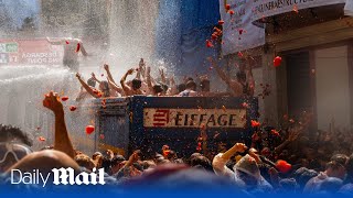 LIVE Revellers play in tomato pulp during quotLa Tomatinaquot festival [upl. by Ahsyas]