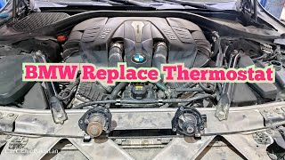 How to replacement thermostat BMW 750 Li Twin Power Turbo [upl. by Anilocin567]