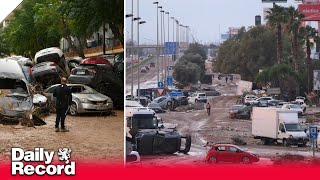 Spain floods death toll rises as search to recover bodies goes on and cleanup continues [upl. by Enailuj]