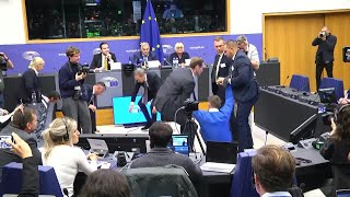 Protester interrupts Viktor Orbans speech at the European Parliament  AFP [upl. by Akehsay]