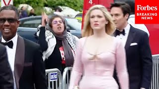 ProPalestinian Protesters Demonstrate As Attendees Of White House Correspondents Dinner Arrive [upl. by Oijimer]