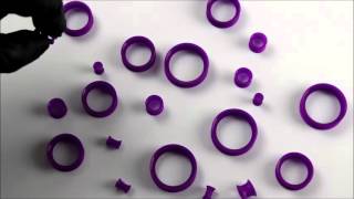 Kaos Purple Silicone Skin Eyelets 6G  1 Inch  UrbanBodyJewelrycom [upl. by Gertrudis]