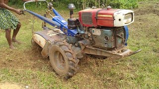 Man working with his tiller in hard soil  Power tiller making vegetable field Farming Area [upl. by Scherle]