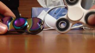 Normal fidget spinner VS rainbow Stainless steel fidget spinner [upl. by Idnal422]