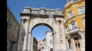 Passing Through the Arch of the Sergi in Pula Istria Croatia [upl. by Karlin823]