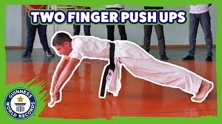 Two finger push ups  Guinness World Records [upl. by Burney]