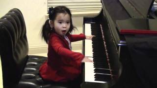 Cute video of an adorable baby girl quotplayingquot the piano and singing Happy Birthday [upl. by Hwu689]