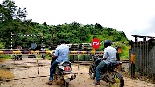 Trains at a Railroad Crossing in India [upl. by Teyugn464]