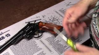 How to Disassemble and Care for a SampW Revolver  Learn from a Factory Trained Armorer [upl. by Sirtimed]