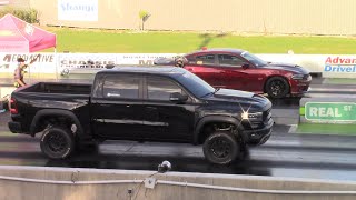 Ram TRX vs 392 Charger ZR1 Corvette amp Hellcat 14 Mile Drag Racing [upl. by Enifesoj254]