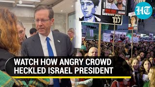 Israel President Left Embarrassed After Booing Heckling At Protest For Hostages On 100th Day Of War [upl. by Iatnahs]