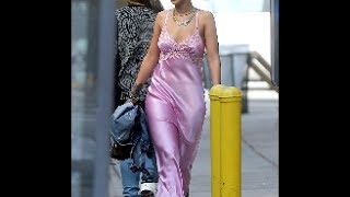 Rihanna stepped out in New York on Tuesday clad in a pink satin nightdress [upl. by Mehalick]