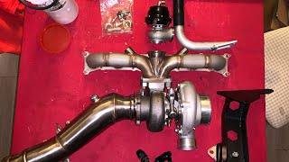 N54 single turbo kit on a BUDGET  overkill garage bottom mount breakdowncosts [upl. by Oinoitna]