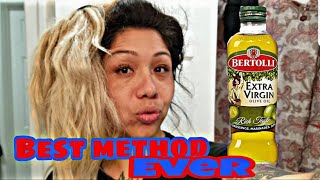 Conditioning hair with cooking oil olive oil [upl. by Atirec35]