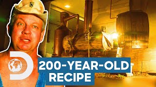 Tim Smith Recreates 200 YearOld Whiskey Recipe Using A Log Still  Moonshiners [upl. by Diann429]