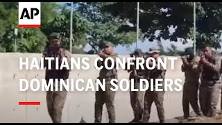 Haitians confront Dominican soldier at the border [upl. by Nich757]