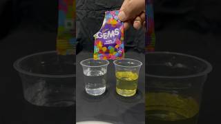 Water and oil experiment using chocolate gems shorts trending experiment science [upl. by Anolla]