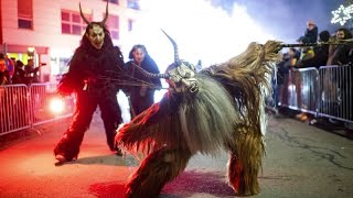 Vienna marks preChristmas period with mythical Krampus parade [upl. by Annatnom372]