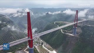 New towering bridge opens to traffic in Chinas mountainous Guizhou Province [upl. by Malcom]