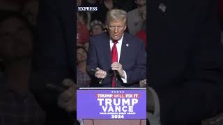 This mic STINKS Donald Trump rips mic from stand during rally [upl. by Nnylasor]