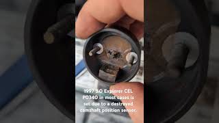 1997 Ford Explorer CEL P0340 failed camshaft position sensor Located under coils 5 min fix [upl. by Eiuqnimod]