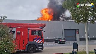 Uitslaande brand verwoest bedrijfsverzamelgebouw in Hellevoetsluis [upl. by Carbrey]