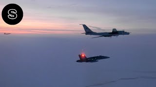 US military detects intercepts Russian fighter jets 2 Chinese H6 bombers prior to Bidens address [upl. by Atinrev]