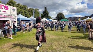 Drum Major Stuart leads Deeside Caledonia Pipe Band march into 2024 Aboyne Highland Games Scotland [upl. by Doralynne]