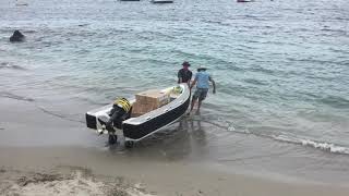 Lauching a tender loaded from the Beach [upl. by Castara]