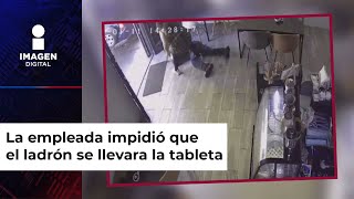 Empleada de cafetería taclea a ladrón que buscaba robarse la tablet del local [upl. by Radec]