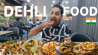 PAKISTANI EATING DELHI FOOD  FAMOUSE DELHI FOOD  INDIAN STREET FOOD [upl. by Yattirb291]