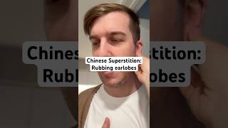 Rubbing earlobes  Chinese superstition 24 [upl. by Acirea]