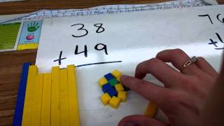 Regrouping using place value blocks [upl. by Eimrej]