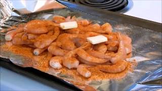 Cooking shrimp on a weber grill using old bay seasoning butter and lime juice [upl. by Allcot479]