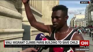 Malian migrant in France saves young child dangling from a balcony [upl. by Burnard]