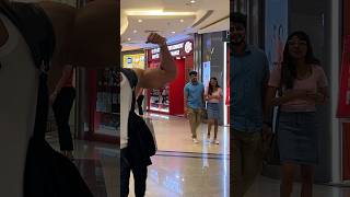 Cute girls reaction on shirtless bodybuilder in mall 😱😂 girlreaction publicrecation [upl. by Akihsar]