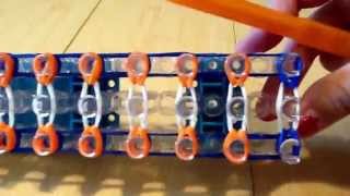 How to make a cats eye bracelet on rainbow loom [upl. by Mosenthal]