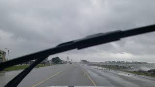 Power poles rocks debris cover US 64 causeway Nags Head [upl. by Llerej]