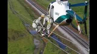 Helicopter Transfering Lineman to Wire [upl. by Lleroj]