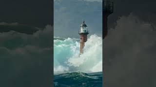 Lighthouse vs Giant Waves – Can It Survive lighthouse bigwaves ocean [upl. by Leterg]