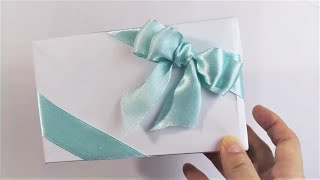 How to tie diagonal ribbon bow on gift wrapping box  禮物盒斜綁蝴蝶結的打法 bowMaking on gift box [upl. by Robbins]