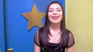 Miranda Cosgrove dishes on The Naked Brothers Band set [upl. by Inahet]