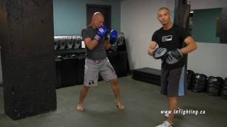 Boxing Basics How to Use Focus Mitts to Train Punching Combinations [upl. by Gean]