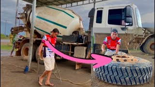 Changing new tire for Cement Mixer truck by hand Changing a truck tire Full Video [upl. by Frolick]