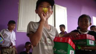 Boy From Thailand Receives a Shoe Box Gift  Operation Christmas Child [upl. by Akeenahs290]